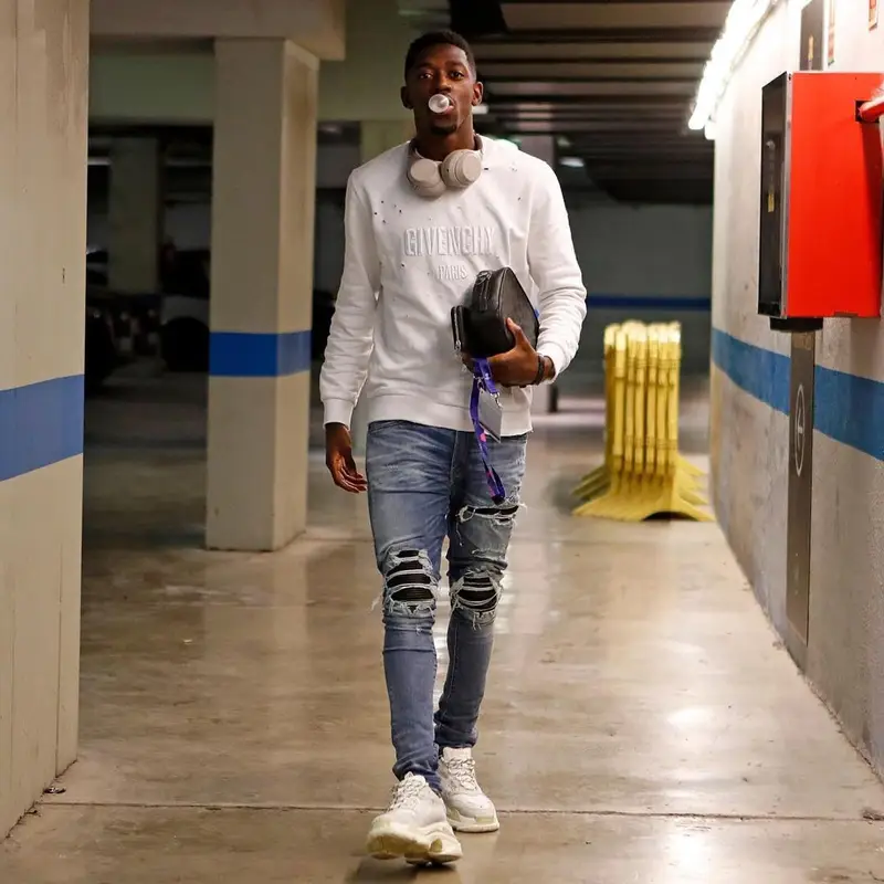 Ousmane Dembele outfit in Givenchy, Amiri, and Louis Vuitton, 2018