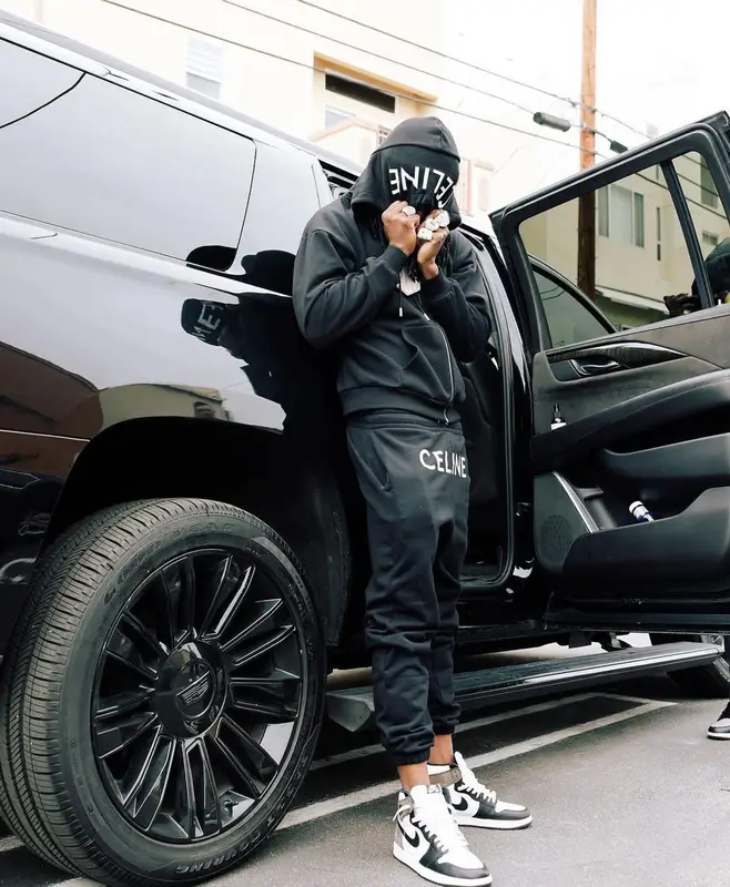 Polo G outfit in Celine and Nike, 2022