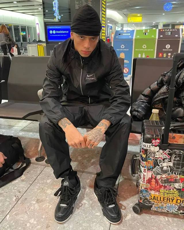 Central Cee outfit in Nike, Louis Vuitton, and Stussy, 2022