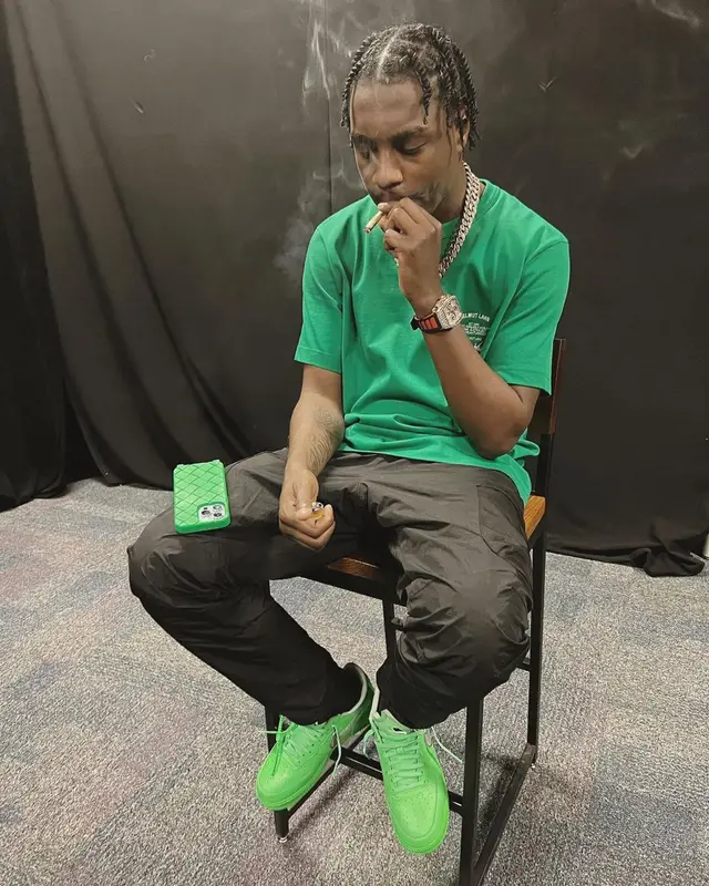 Lil Tjay outfit in Helmut Lang, Nike, and Bottega Veneta, 2022
