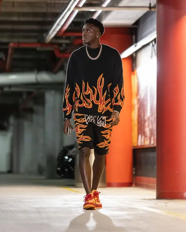 Victor Olapido outfit in Palm Angels and Louis Vuitton, 2022
