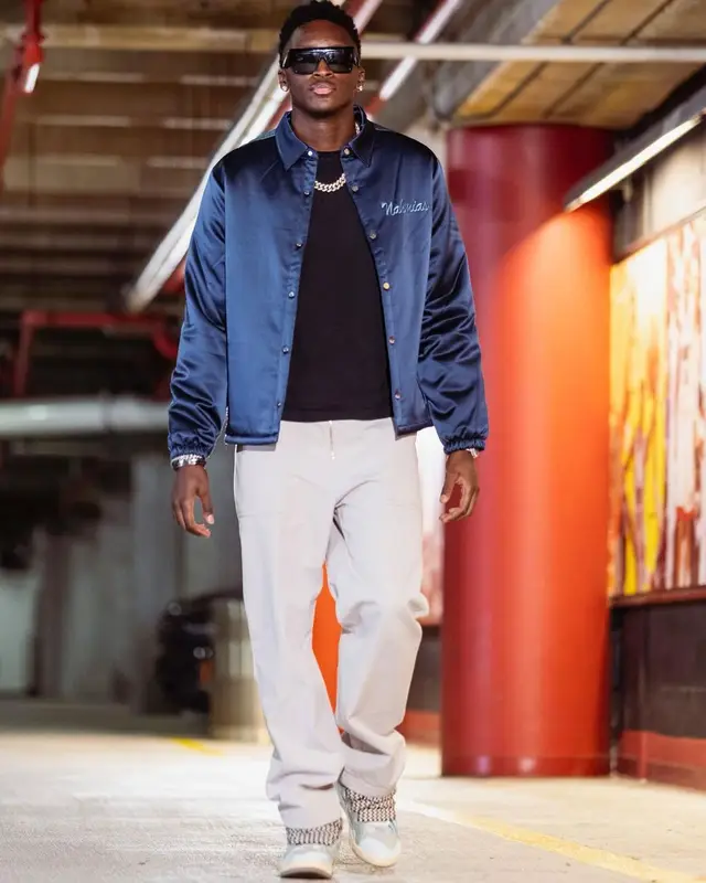 Victor Olapido outfit in Nahmias, Lanvin, and Celine, 2022