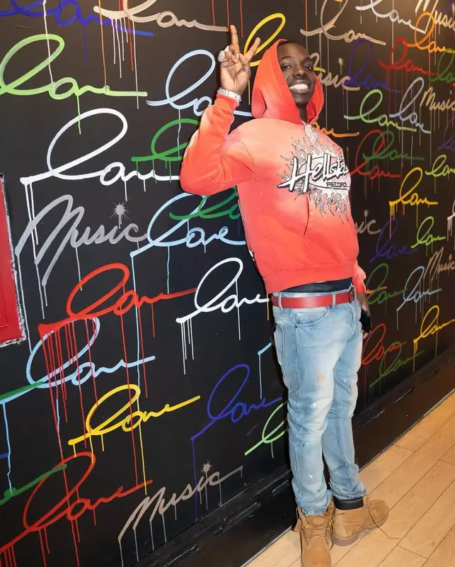 Bobby Shmurda outfit in Hellstar, Timberland, and Prada, 2022