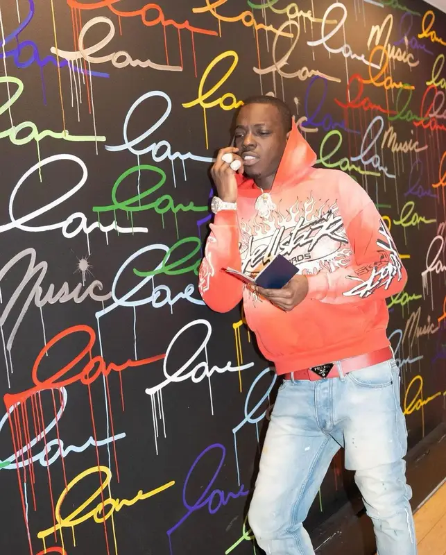 Bobby Shmurda outfit in Hellstar, Timberland, and Prada, 2022