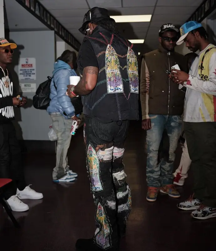 Burna Boy outfit in Who Decides War, Lanvin, and Gallery Dept., 2022