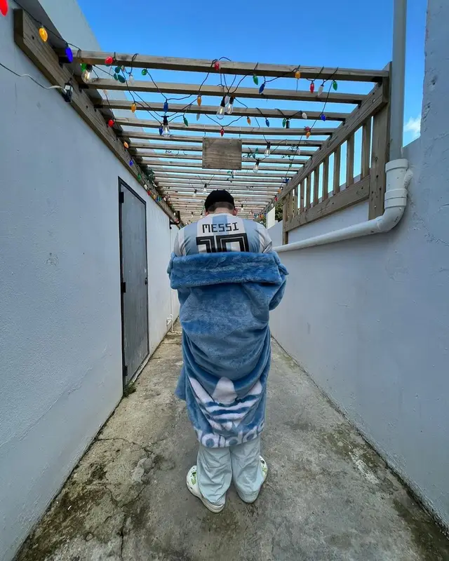 Bad Bunny outfit in Adidas, Rick Owens, and Ivy Park, 2022
