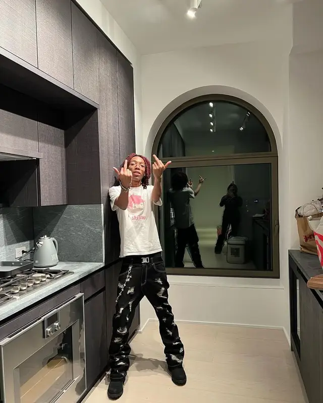Lil Tecca outfit in Timberland, Alyx, and Ray-Ban, 2022