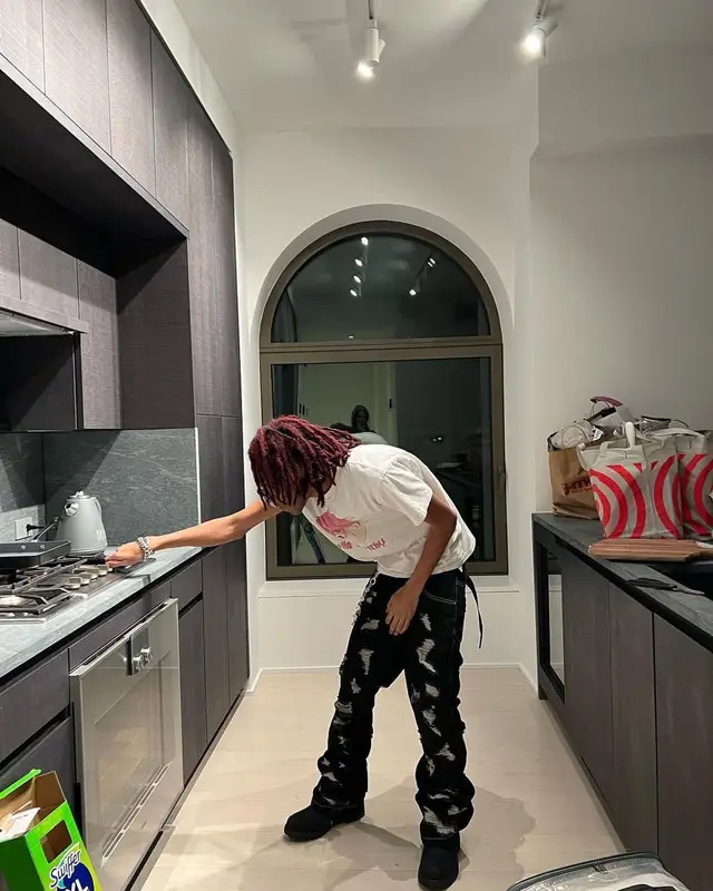 Lil Tecca outfit in Timberland, Alyx, and Ray-Ban, 2022
