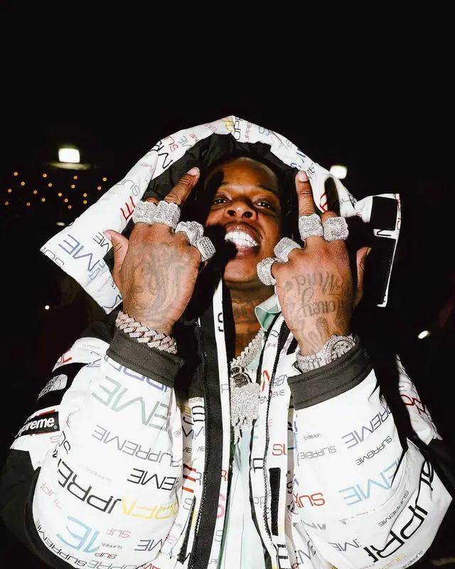 Finesse2tymes outfit in Supreme, Cartier, and The North Face, 2022