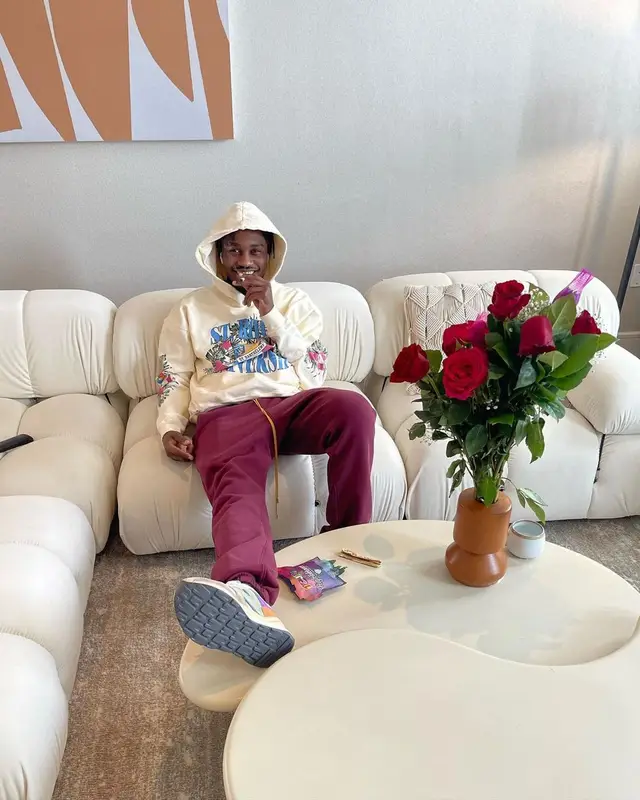 Lil Tjay outfit in Rhude and New Balance, 2022