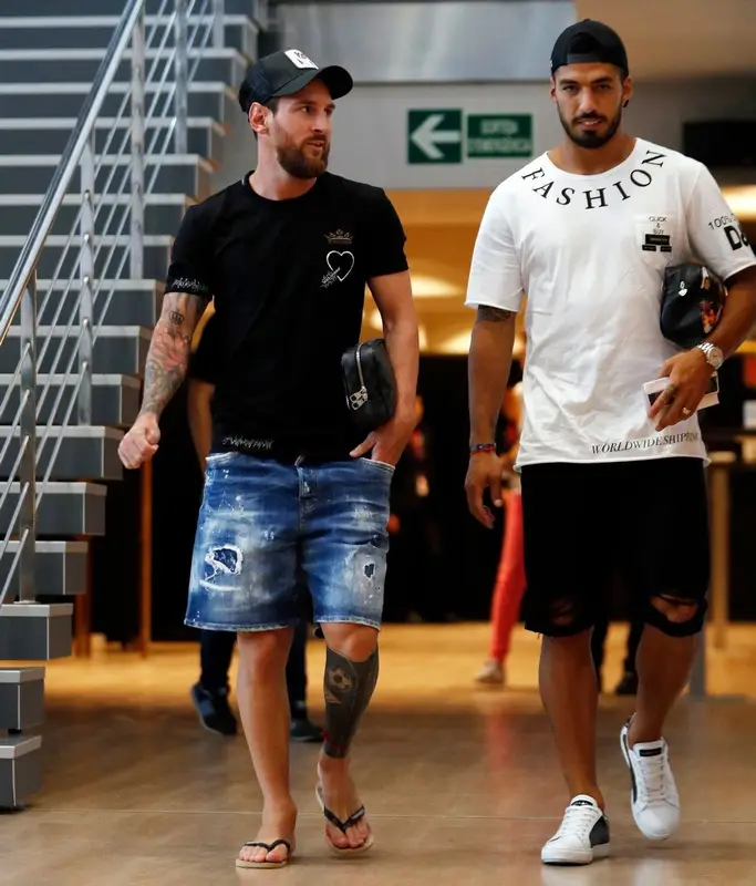 Lionel Messi outfit in Dolce & Gabbana, Louis Vuitton, and Goorin Bros, 2017