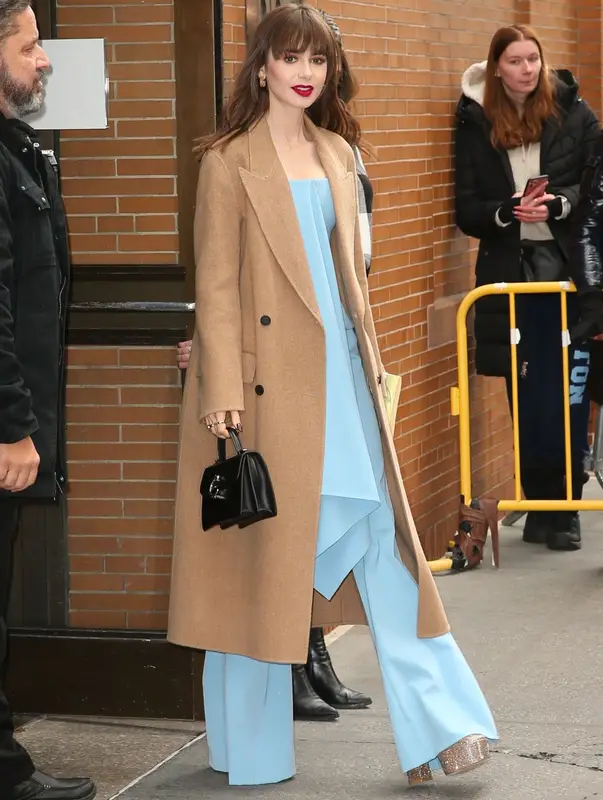 Lily Collins outfit in Del Core, Valentino, and Cartier, 2022