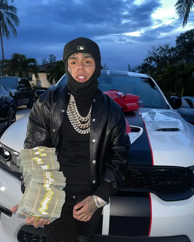6ix9ine outfit in Givenchy, Amiri, and Crocs, 2022