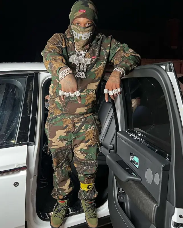 Finesse2tymes outfit in Jordan and Supreme, 2022