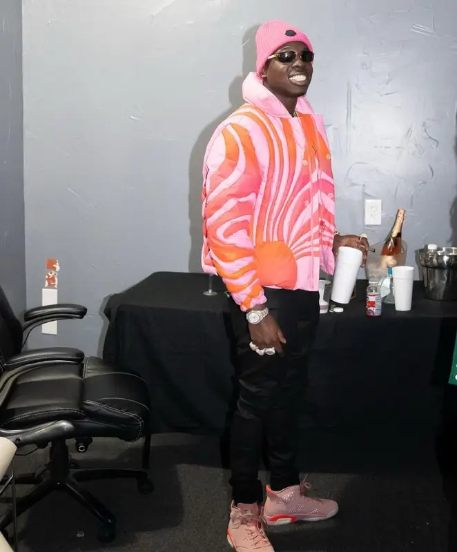 Bobby Shmurda outfit in ERL, Cartier, and Moncler, 2022