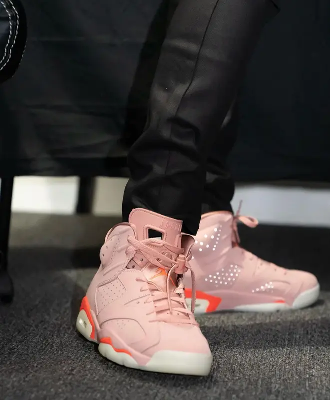 Bobby Shmurda outfit in ERL, Cartier, and Moncler, 2022
