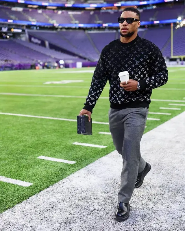 Saquon Barkley outfit in Alexander McQueen and Louis Vuitton, 2022