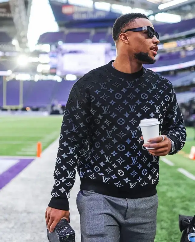 Saquon Barkley outfit in Alexander McQueen and Louis Vuitton, 2022