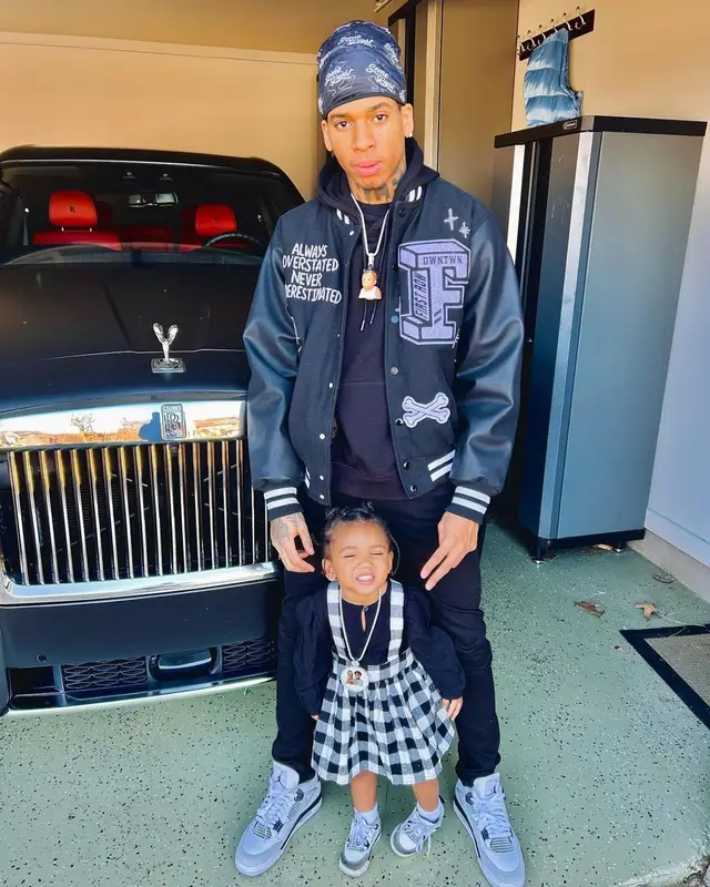 NLE Choppa outfit in First Row Denim, Dolce & Gabbana, and Jordan, 2022