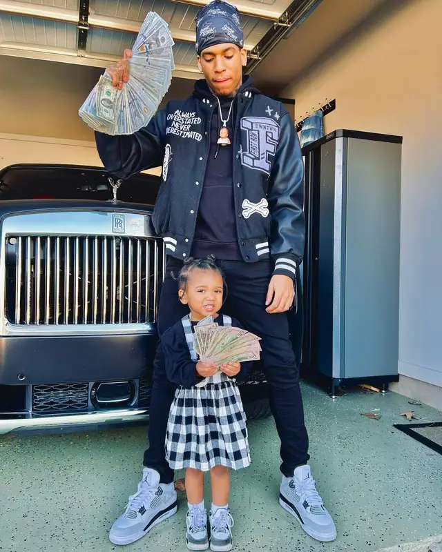 NLE Choppa outfit in First Row Denim, Dolce & Gabbana, and Jordan, 2022