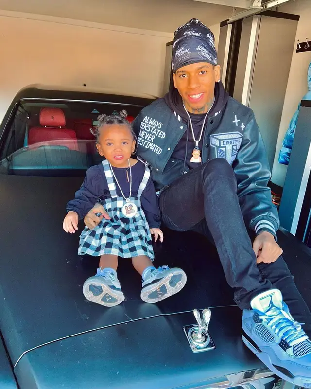 NLE Choppa outfit in First Row Denim, Dolce & Gabbana, and Jordan, 2022
