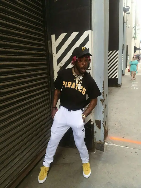 Lil Uzi Vert outfit in MLB, Adidas, and New Era, 2017
