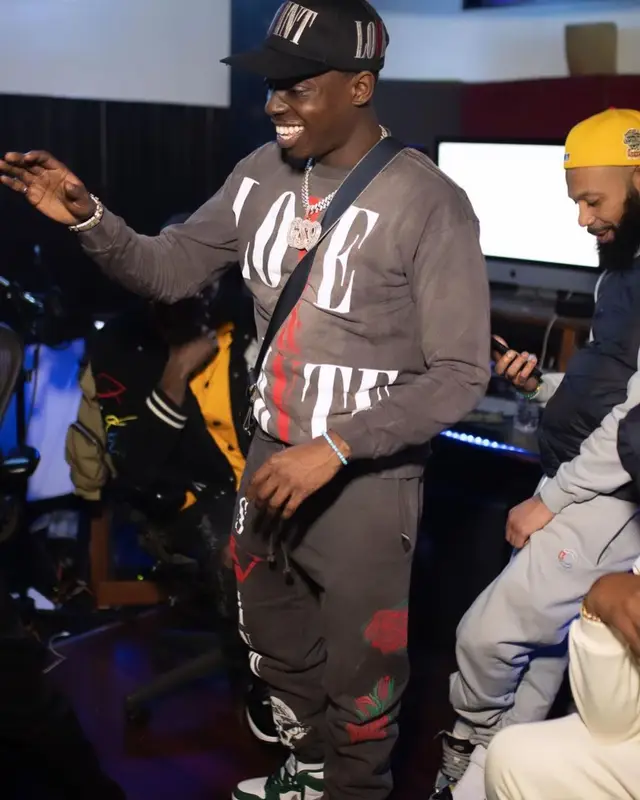 Bobby Shmurda outfit in Nike, Vlone, and Saint Michael, 2022