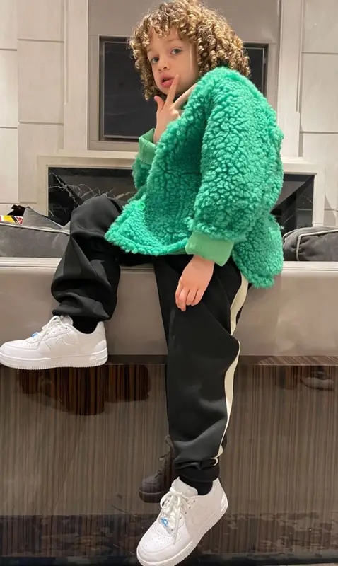 Adonis Graham outfit in Stand Studio, Nike, and Drake Merch, 2022
