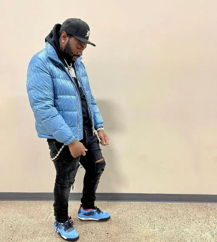Peezy outfit in Dior, Fear of God, and New Era, 2022