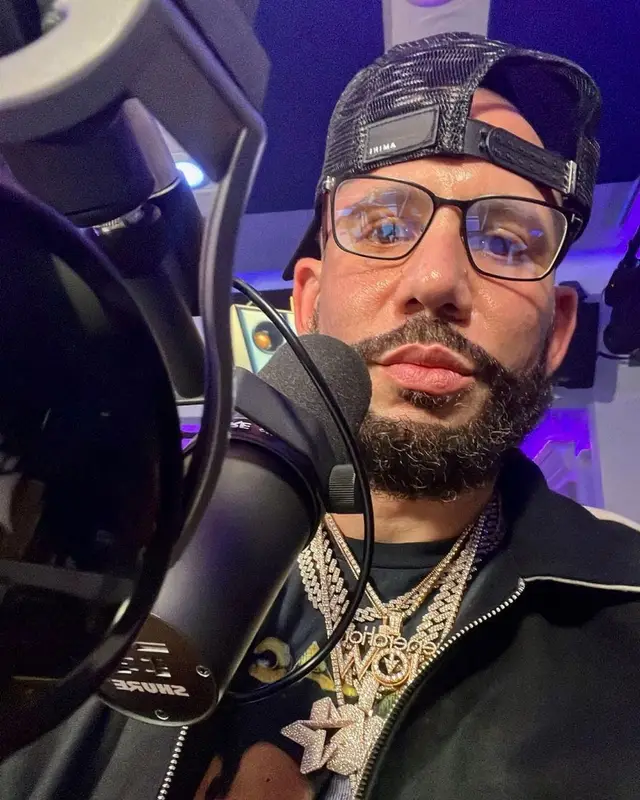 DJ Drama outfit in Rhude, Tom Ford, and Amiri, 2022