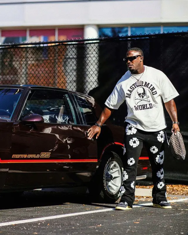 Devin White outfit in Mastermind, Readymade, and Prada, 2022