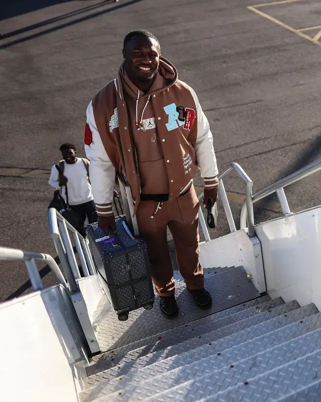 Devin White outfit in Jordan, Nike, and Travis Scott Merch, 2022