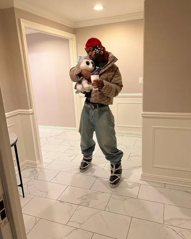 Lil Nas X outfit in Balenciaga and Rick Owens, 2022