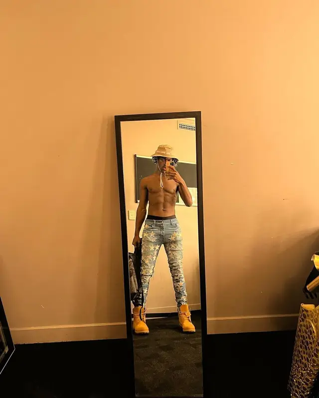Lil Nas X outfit in Amiri, Nike, and Chemist, 2022