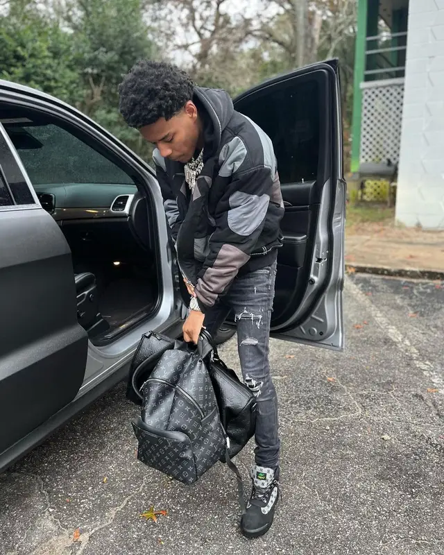Nardo Wick outfit in Who Decides War, Supreme, and True Religion, 2023