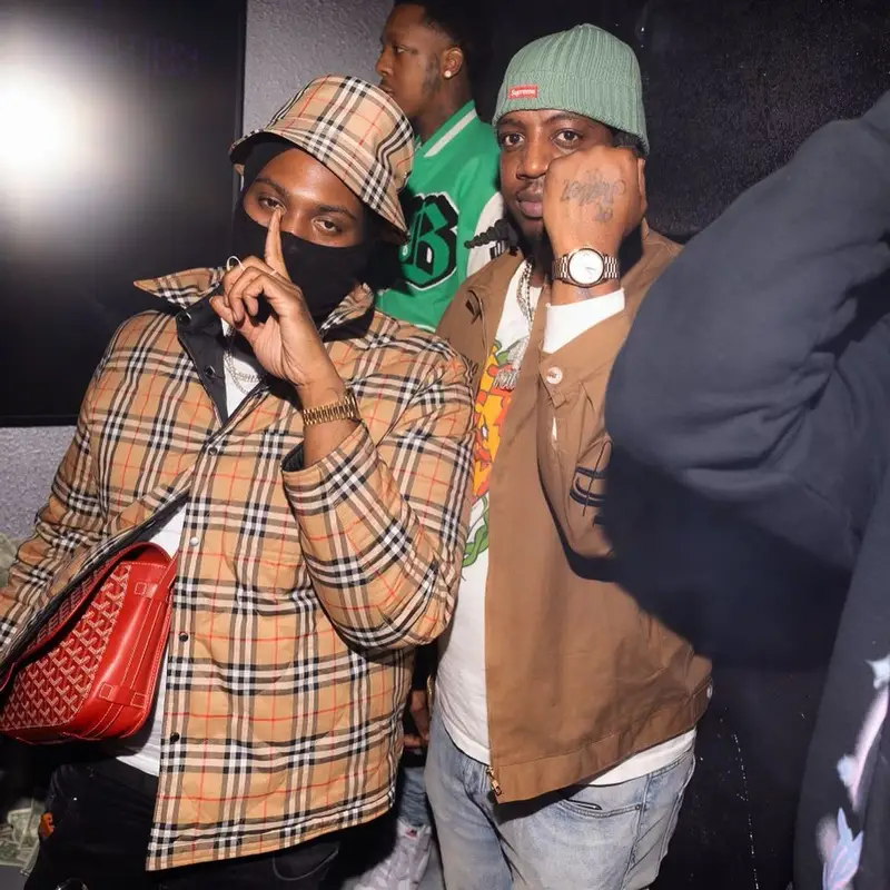 Peezy outfit in Nike, Goyard, and Burberry, 2023