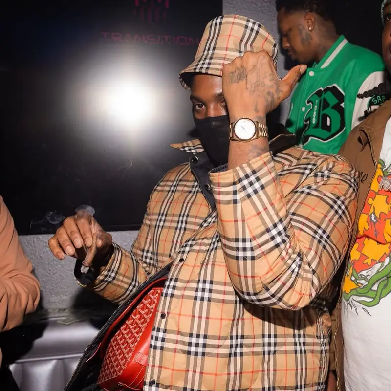 Peezy outfit in Nike, Goyard, and Burberry, 2023