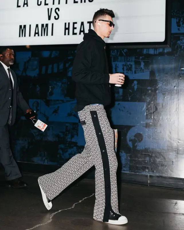 Tyler Herro outfit in Versace, Balmain, and Saint Laurent, 2023