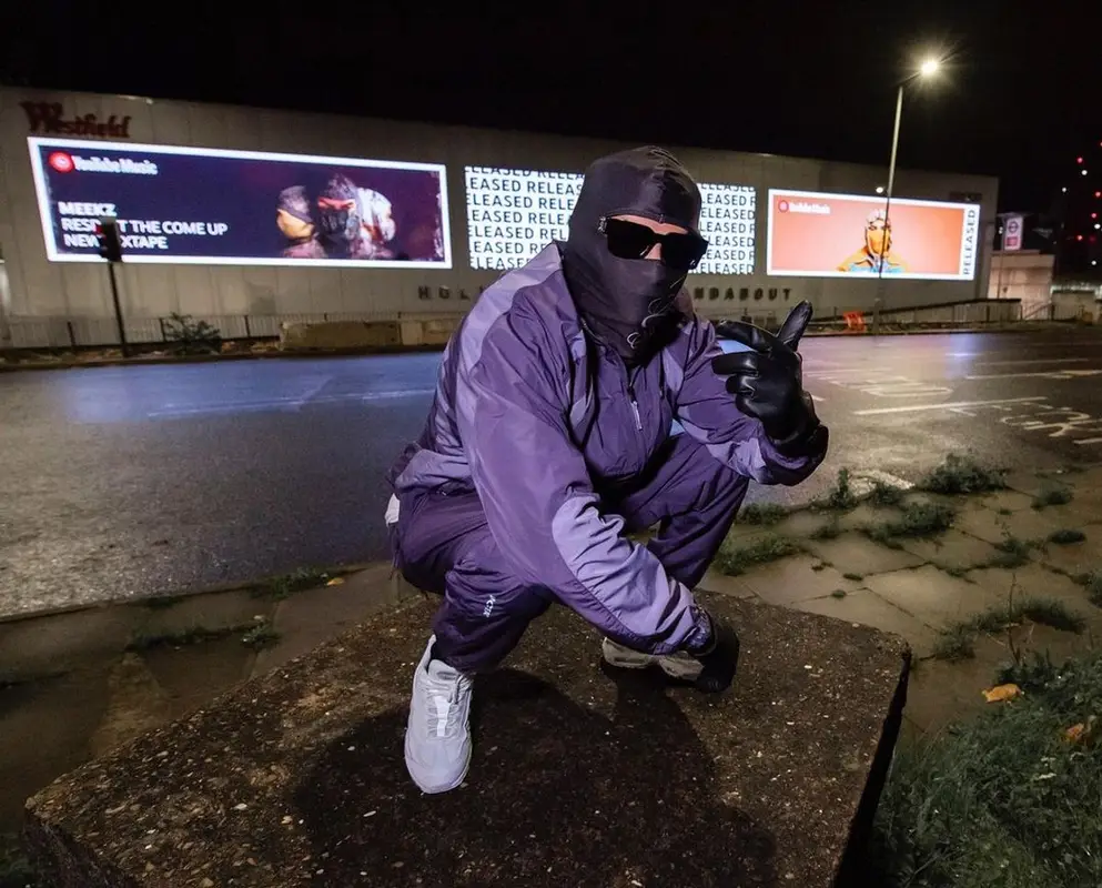 Meekz outfit in Nike, Louis Vuitton, and Nocta, 2022