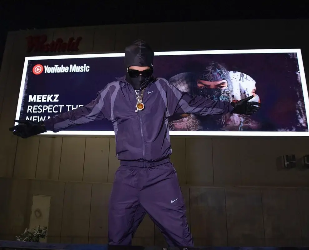 Meekz outfit in Nike, Louis Vuitton, and Nocta, 2022