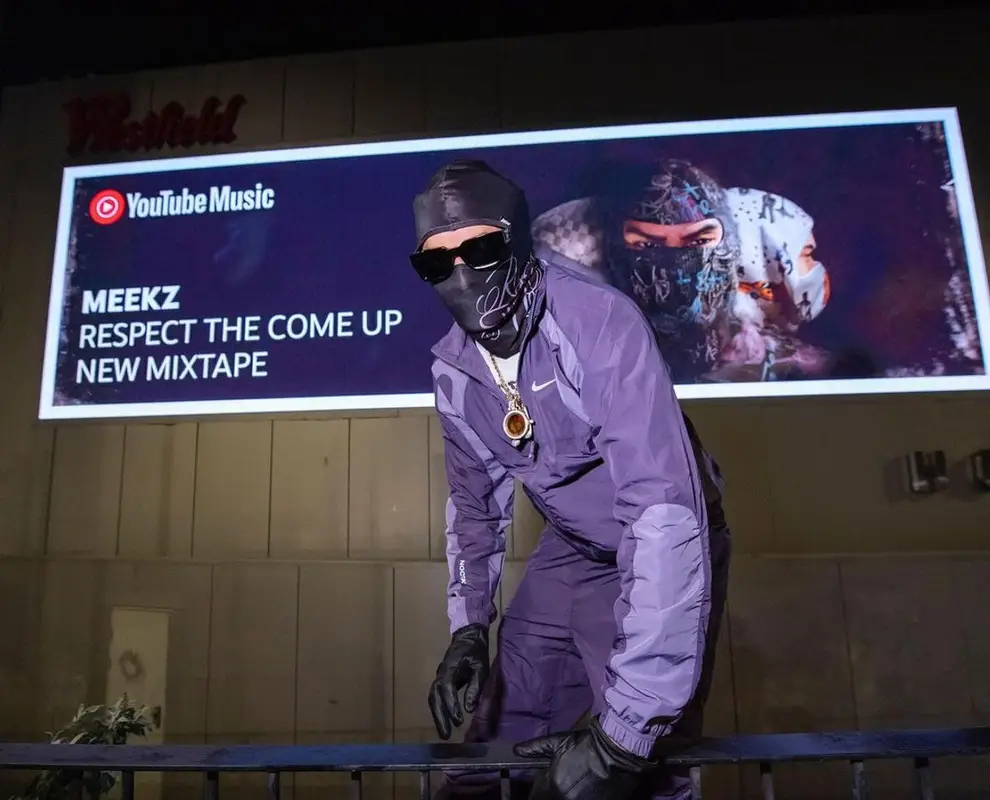 Meekz outfit in Nike, Louis Vuitton, and Nocta, 2022