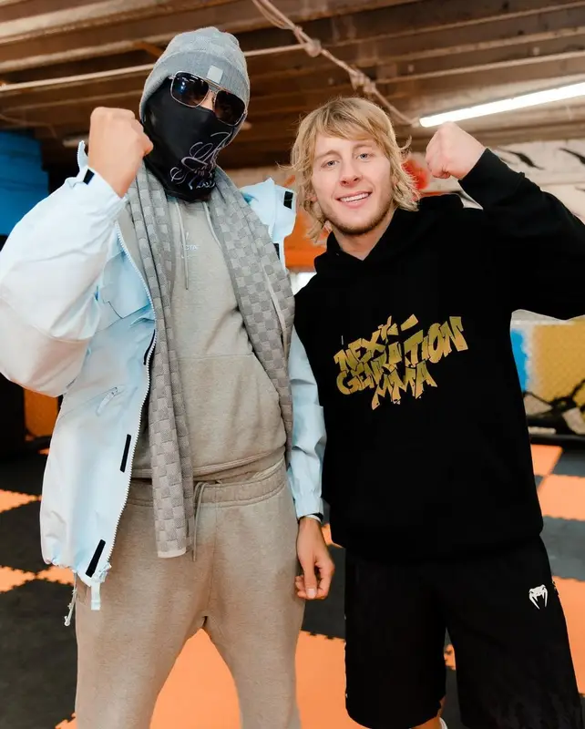 Meekz outfit in Nike, Louis Vuitton, and Nocta, 2022