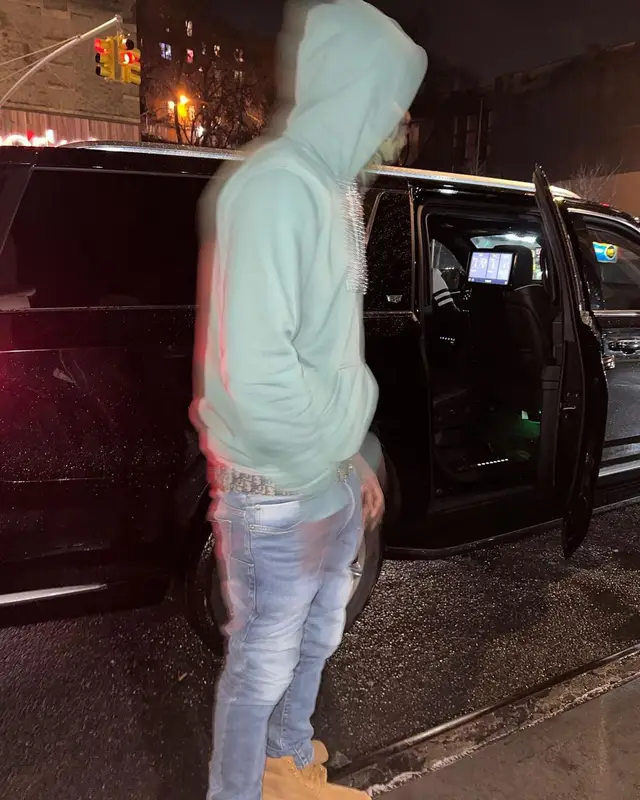 Lil Tjay outfit in Dior, Amiri, and Timberland, 2023
