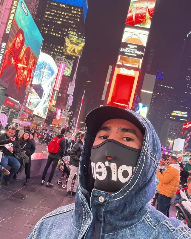 Achraf Hakimi outfit in True Religion, Louis Vuitton, and Supreme, 2023