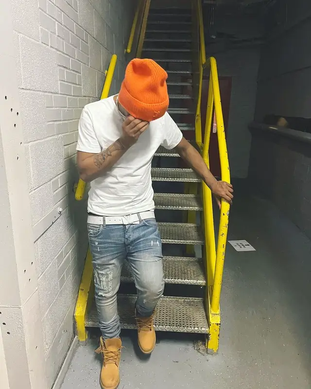 Homixide Beno! outfit in Amiri, Timberland, and Louis Vuitton, 2022