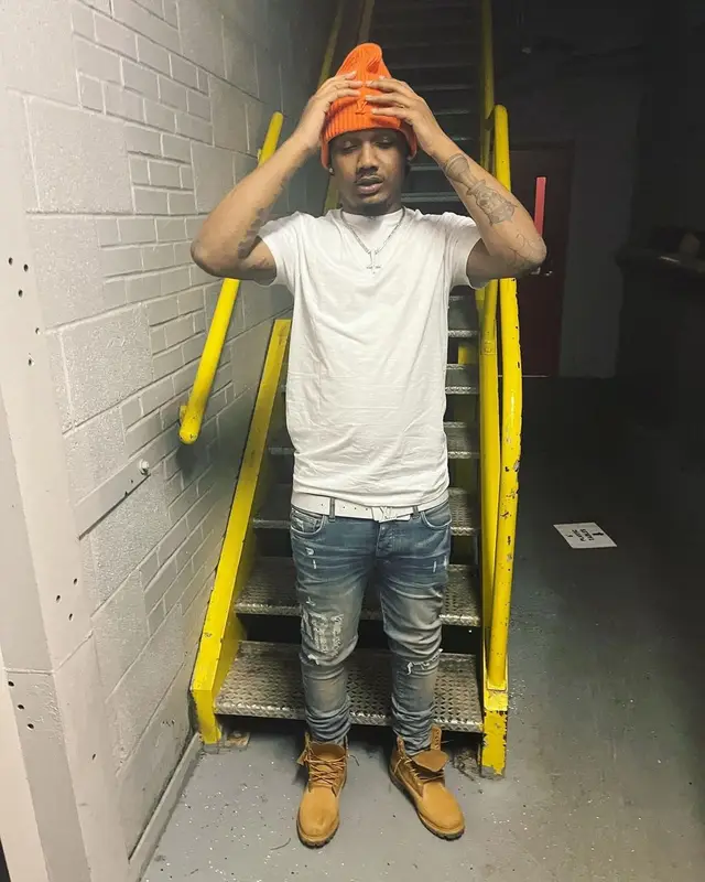Homixide Beno! outfit in Amiri, Timberland, and Louis Vuitton, 2022