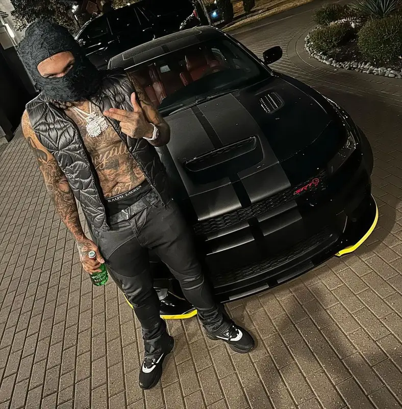 Money Man outfit in Louis Vuitton, Dior, and Polo Ralph Lauren, 2023