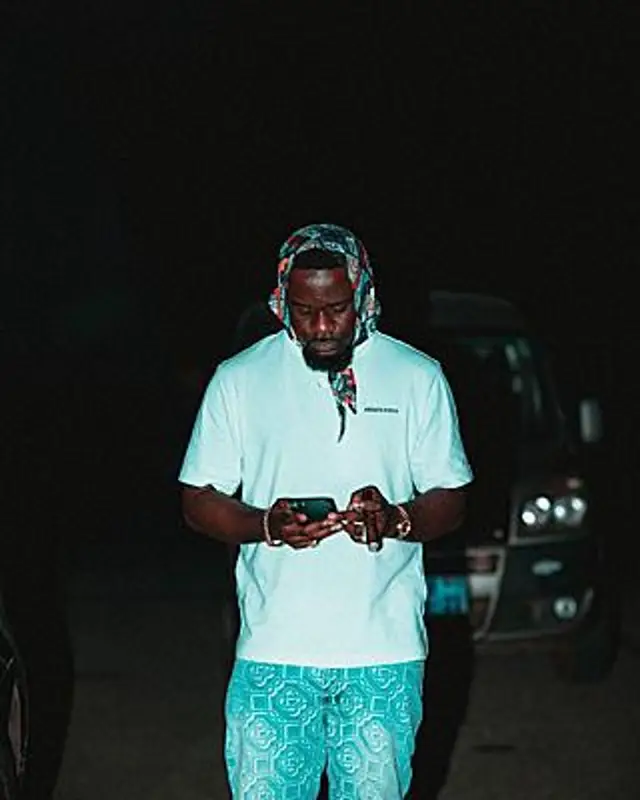Sarkodie outfit in Axel Arigato, Casablanca, and Bottega Veneta, 2023