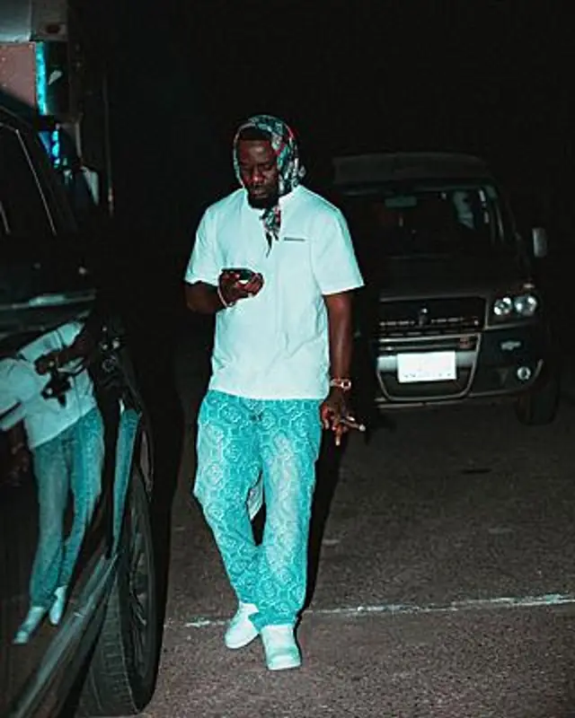 Sarkodie outfit in Axel Arigato, Casablanca, and Bottega Veneta, 2023