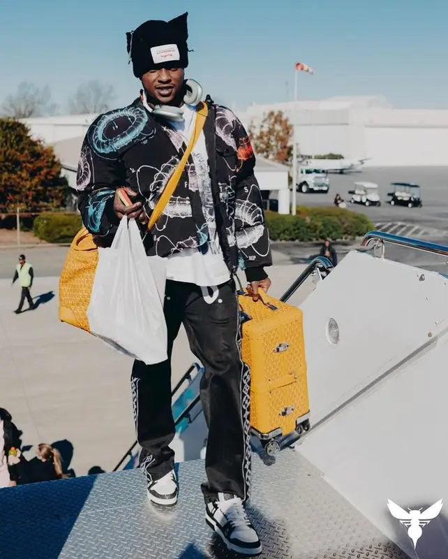 Terry Rozier outfit in MSFTSrep, Loverboy by Charles Jeffrey, and Apple, 2023